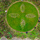 we resist. Ornamental garden by Eva-Maria Lopez, using a variety of plants that have developed resistance to herbicides sold by multi-national chemical companies. The ornament represents these companies’ logos and is reminiscent of “jardins à la française”. Exhibition OU\ /ERT, Bourges; France Photo; Axel Heise
